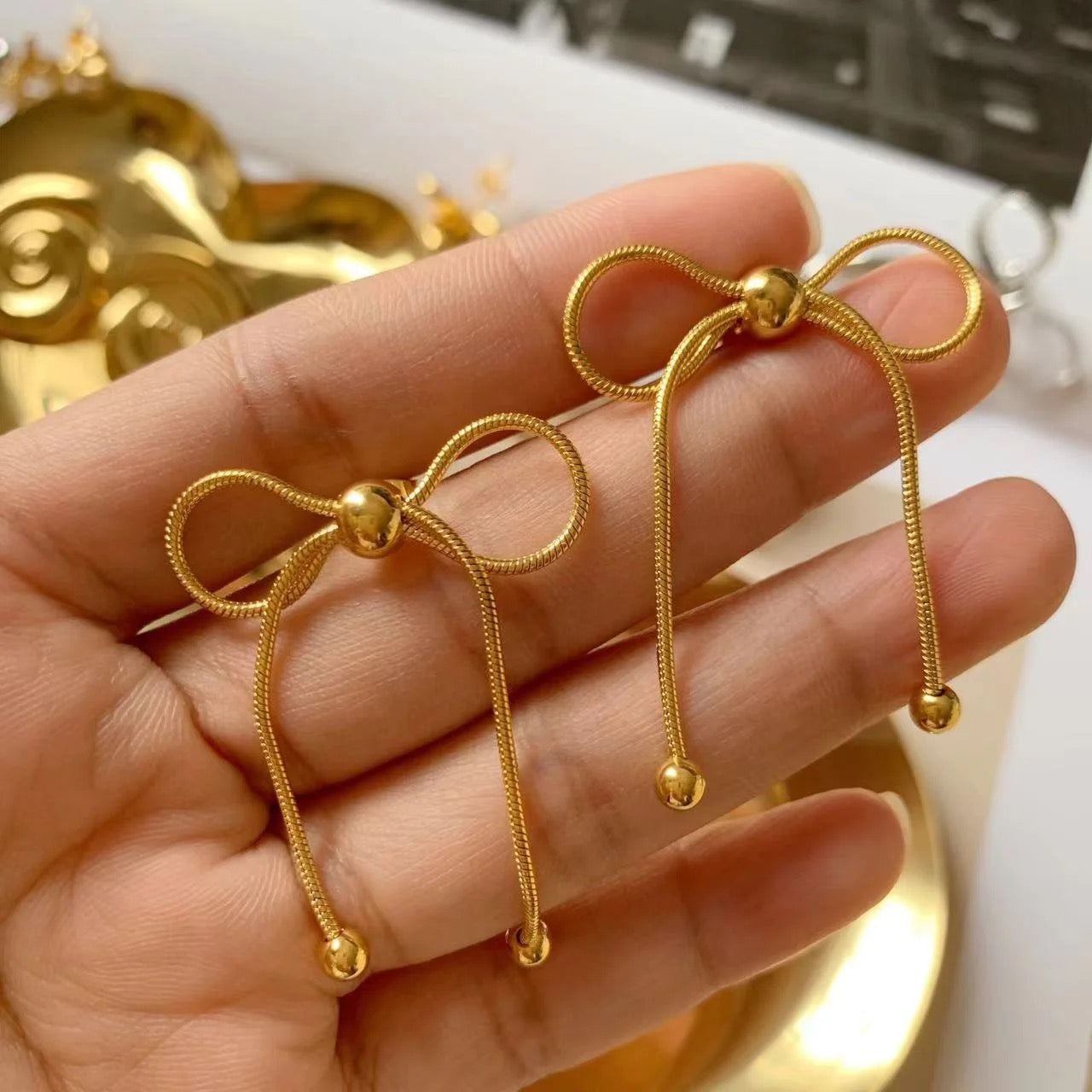 Bow me away earrings- 18k Gold Plated