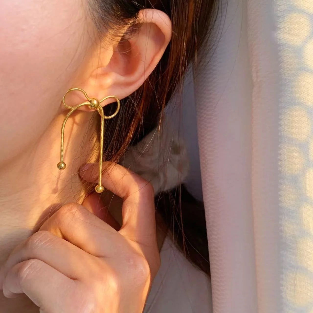 Bow me away earrings- 18k Gold Plated